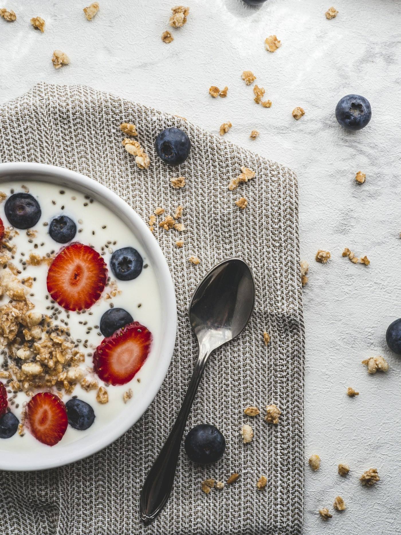 A bowl of yogurt with fruit